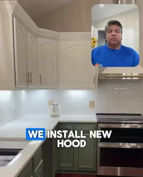 A man in a blue shirt appears in a video overlay while a new kitchen range hood is being installed above a stainless steel stove.
